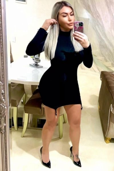 Mirror selfie of Buffy in a dress 