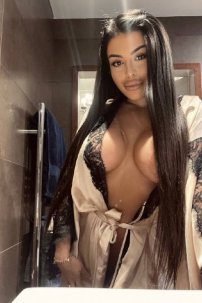Georgia looks very sexy with her robe undone 