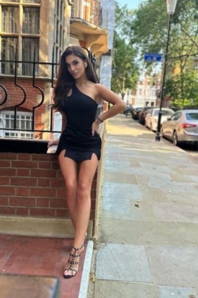 Chardonnay is wearing a black dress with sexy high heels 