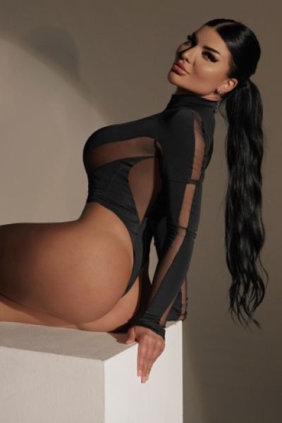 Haifa has on a sexy black silk body 